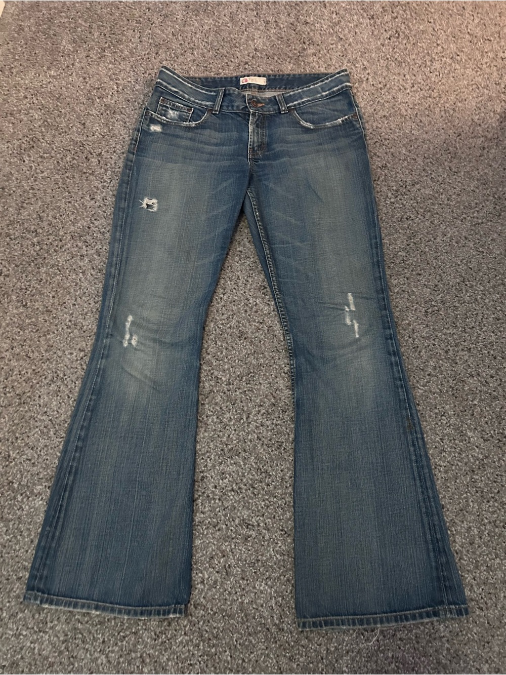 Buckle Women's Medium Blue Flare Jeans with Distressed Accents